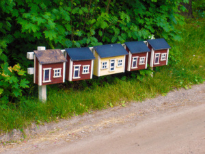Mailboxes painted in the traditional Finnish colors